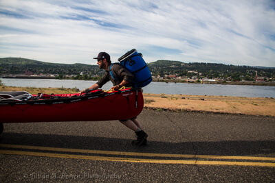 Martin Trahan pushing his canoe with his LOWA Renegade GTX Mid during a very long portage